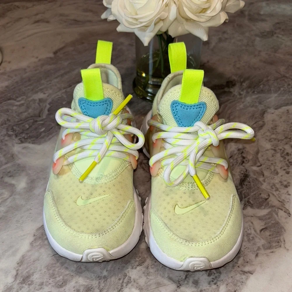 Nike Yellow and Blue React Sneakers Dynamic Design